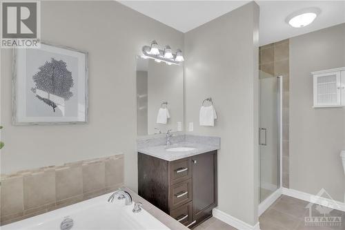 Ensuite bathroom w/Quartz topped vanity and brand new glass shower door! - 368 Horseshoe Crescent, Stittsville, ON - Indoor Photo Showing Bathroom