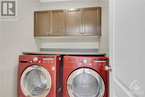 Walk in laundryroom w/built in cabinets is conveniently located on the 2nd level as well! - 368 Horseshoe Crescent, Stittsville, ON - Indoor Photo Showing Laundry Room