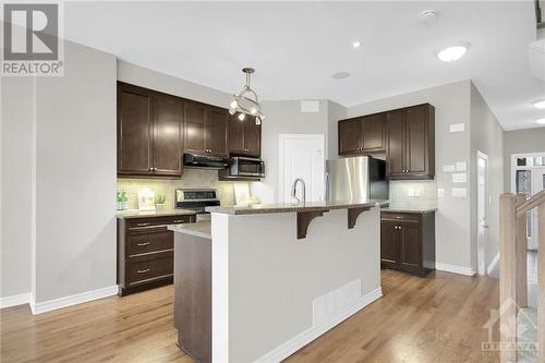 Nicely designed kitchen w/large pantry and breakfast bar! - 368 Horseshoe Crescent, Stittsville, ON - Indoor Photo Showing Kitchen