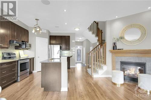 Beautiful hardwood floors refinished October 2024! - 368 Horseshoe Crescent, Stittsville, ON - Indoor Photo Showing Other Room With Fireplace