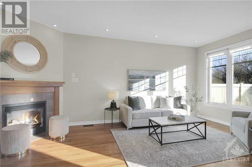 Freshly painted throughout majority of home Oct 2024, captivating gas fireplace - 368 Horseshoe Crescent, Stittsville, ON - Indoor Photo Showing Living Room With Fireplace