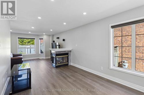 5609 Sidmouth Street, Mississauga, ON - Indoor Photo Showing Living Room With Fireplace