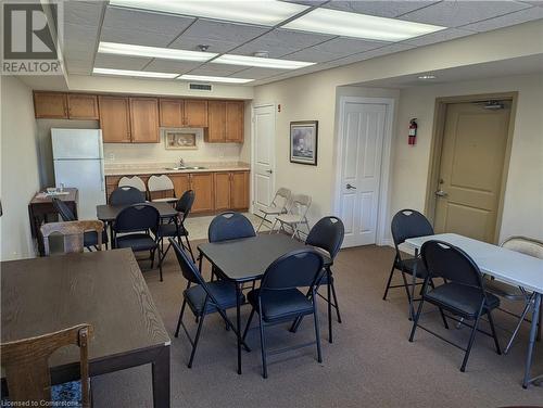 Carpeted dining area featuring sink - 56 Kerman Avenue Unit# 312, Grimsby, ON - Indoor