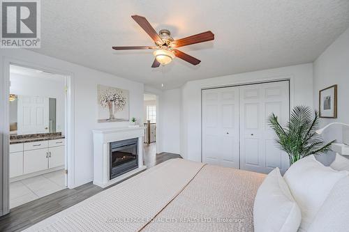 173 Clair Road W, Guelph, ON - Indoor Photo Showing Bedroom With Fireplace