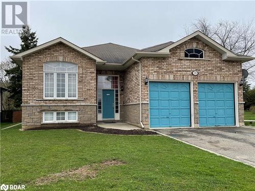 View of front of house featuring a garage and a front lawn - 316 Main Street W, Dundalk, ON - Outdoor