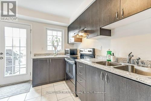 691 Laking Terrace, Milton, ON - Indoor Photo Showing Kitchen With Double Sink