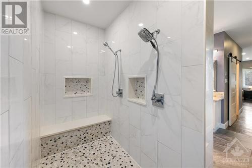 his and hers shower heads... - 875 Deertail Lane, Ottawa, ON - Indoor Photo Showing Bathroom