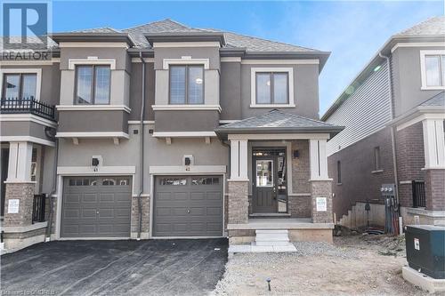 Prairie-style house featuring a garage - 620 Colborne Street W Unit# 42, Brantford, ON - Outdoor With Facade