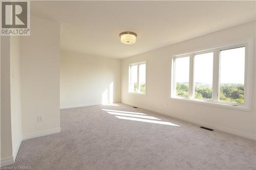 View of carpeted empty room - 620 Colborne Street W Unit# 42, Brantford, ON - Indoor Photo Showing Other Room