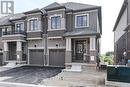 Prairie-style house featuring a balcony and a garage - 620 Colborne Street W Unit# 42, Brantford, ON  - Outdoor With Balcony With Facade 