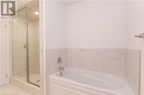 Bathroom featuring plus walk in shower - 620 Colborne Street W Unit# 42, Brantford, ON - Indoor Photo Showing Bathroom