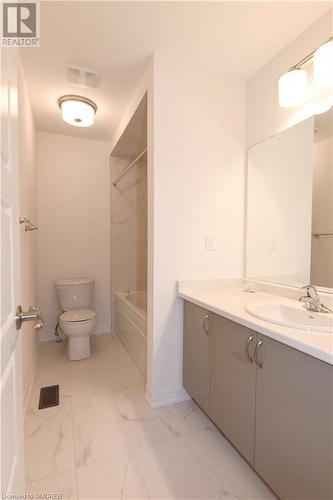 Full bathroom with vanity, toilet, and tiled shower / bath - 620 Colborne Street W Unit# 42, Brantford, ON - Indoor Photo Showing Bathroom