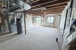 Basement with water heater and heating unit - 