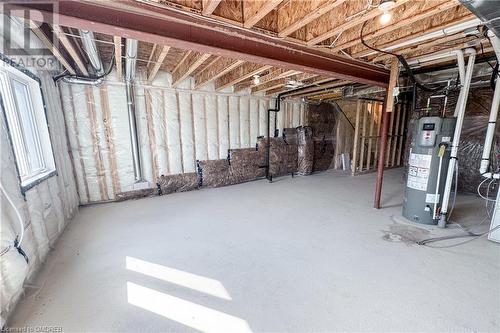 Basement featuring water heater - 620 Colborne Street W Unit# 42, Brantford, ON - Indoor Photo Showing Basement