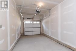 Garage featuring a garage door opener - 