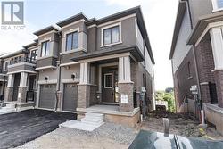 View of front of house featuring a garage - 