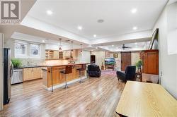 View of lower level dining area and kitchen. - 