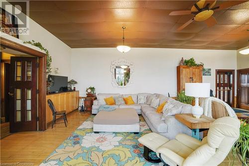 Living room featuring light hardwood / wood-style floors and ceiling fan - 687 Highway 6 Highway, Caledonia, ON - Indoor Photo Showing Living Room