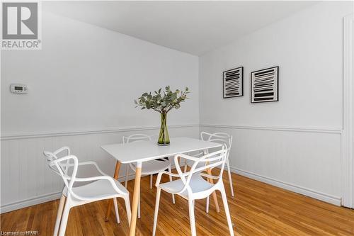 Dining room featuring wood-type flooring - 233 Nile Street, Stratford, ON - Indoor Photo Showing Dining Room