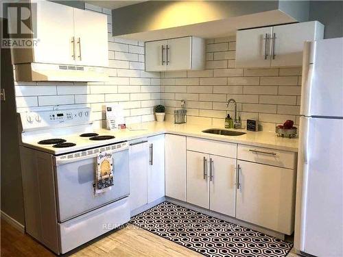 Bsmt - 34 Clune Place, Whitby, ON - Indoor Photo Showing Kitchen