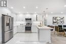 210 - 7440 Bathurst Street, Vaughan, ON  - Indoor Photo Showing Kitchen With Double Sink With Upgraded Kitchen 