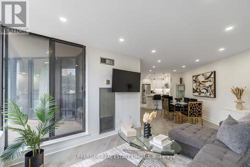 210 - 7440 Bathurst Street, Vaughan, ON - Indoor Photo Showing Living Room