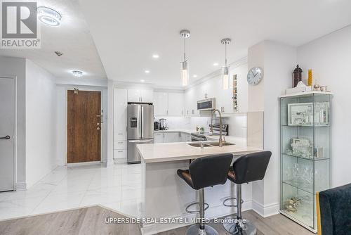 210 - 7440 Bathurst Street, Vaughan, ON - Indoor Photo Showing Kitchen With Double Sink With Upgraded Kitchen