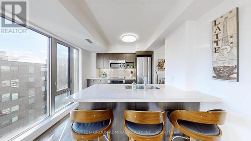 E807 - 555 Wilson Avenue E, Toronto, ON - Indoor Photo Showing Kitchen With Stainless Steel Kitchen With Upgraded Kitchen