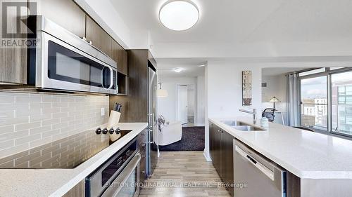 E807 - 555 Wilson Avenue E, Toronto, ON - Indoor Photo Showing Kitchen With Double Sink With Upgraded Kitchen