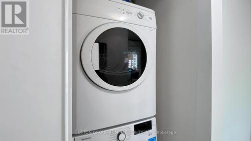 E807 - 555 Wilson Avenue E, Toronto, ON - Indoor Photo Showing Laundry Room