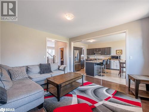 Living room featuring sink and light wood-type flooring - 3046 Stone Ridge Boulevard, Orillia, ON - Indoor Photo Showing Living Room