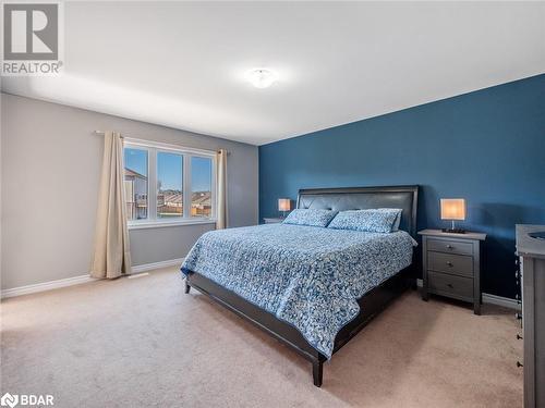 Bedroom featuring light carpet - 3046 Stone Ridge Boulevard, Orillia, ON - Indoor Photo Showing Bedroom