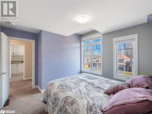 Carpeted bedroom featuring sink - 3046 Stone Ridge Boulevard, Orillia, ON - Indoor Photo Showing Bedroom