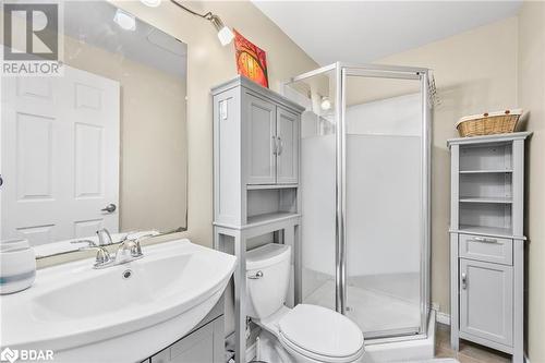 Bathroom with walk in shower, tile patterned floors, sink, and toilet - 3046 Stone Ridge Boulevard, Orillia, ON - Indoor Photo Showing Bathroom