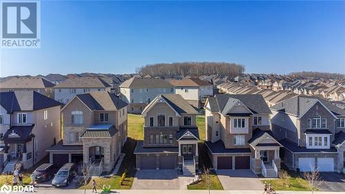 View of front of house featuring a garage - 3046 Stone Ridge Boulevard, Orillia, ON - Outdoor With Facade