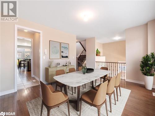 Dining area with hardwood / wood-style floors - 3046 Stone Ridge Boulevard, Orillia, ON - Indoor Photo Showing Dining Room