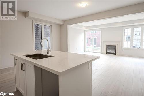 11 Amsterdam Drive, Barrie, ON - Indoor Photo Showing Kitchen With Fireplace