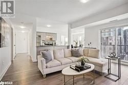 Living room featuring light wood-type flooring - 