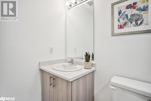 Bathroom featuring vanity and toilet - 8 Culinary Lane Unit# 402, Barrie, ON - Indoor Photo Showing Bathroom