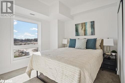 Bedroom with carpet flooring - 8 Culinary Lane Unit# 402, Barrie, ON - Indoor Photo Showing Bedroom