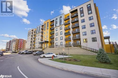 View of property - 8 Culinary Lane Unit# 402, Barrie, ON - Outdoor With Balcony With Facade