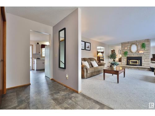 5152 32 St, Rural Wetaskiwin County, AB - Indoor Photo Showing Living Room With Fireplace