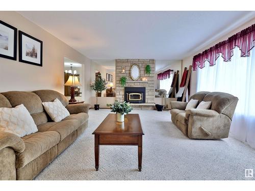 5152 32 St, Rural Wetaskiwin County, AB - Indoor Photo Showing Living Room With Fireplace