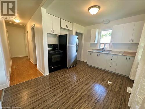 Main Floor Eat-in Kitchen - 15 Cornell Avenue, Kitchener, ON - Indoor Photo Showing Kitchen With Double Sink