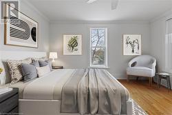 Bedroom 1 with ornamental molding, and ceiling fan - 