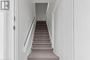 Staircase featuring ornamental molding and carpet - 635 Laurel Street Unit# Upper Unit, Cambridge, ON  - Indoor Photo Showing Other Room 