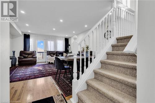 Stairway with wood-type flooring - 50 Howe Drive Unit# 17B, Kitchener, ON - Indoor Photo Showing Other Room