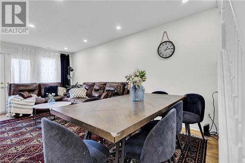 Dining area featuring hardwood / wood-style flooring - 50 Howe Drive Unit# 17B, Kitchener, ON - Indoor Photo Showing Living Room