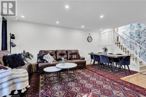 Living room featuring wood-type flooring - 50 Howe Drive Unit# 17B, Kitchener, ON - Indoor