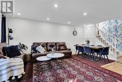 Living room featuring wood-type flooring - 